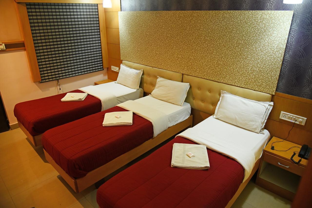 Grand Choice Hotell Bangalore Rom bilde