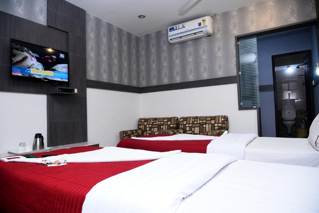 Grand Choice Hotell Bangalore Rom bilde